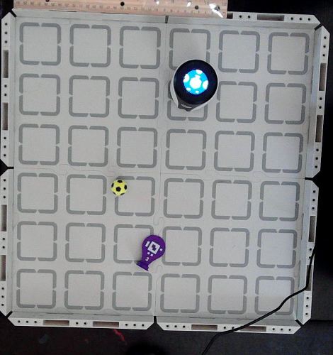 Real overhead camera, end of Model B · attempt 1: knocked the tag down with a kicked ball